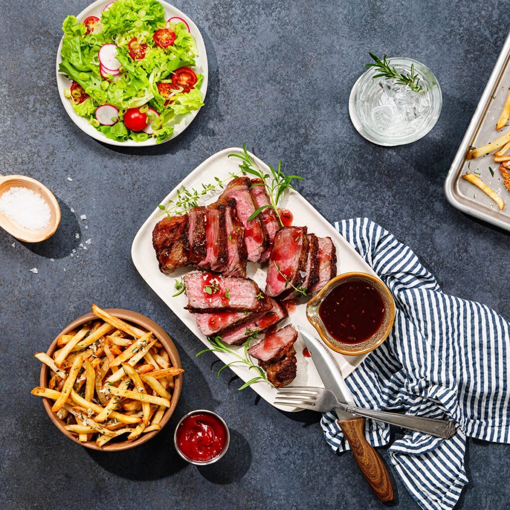 Steaks with Red Wine Jus & Garlic Frites Holland House
